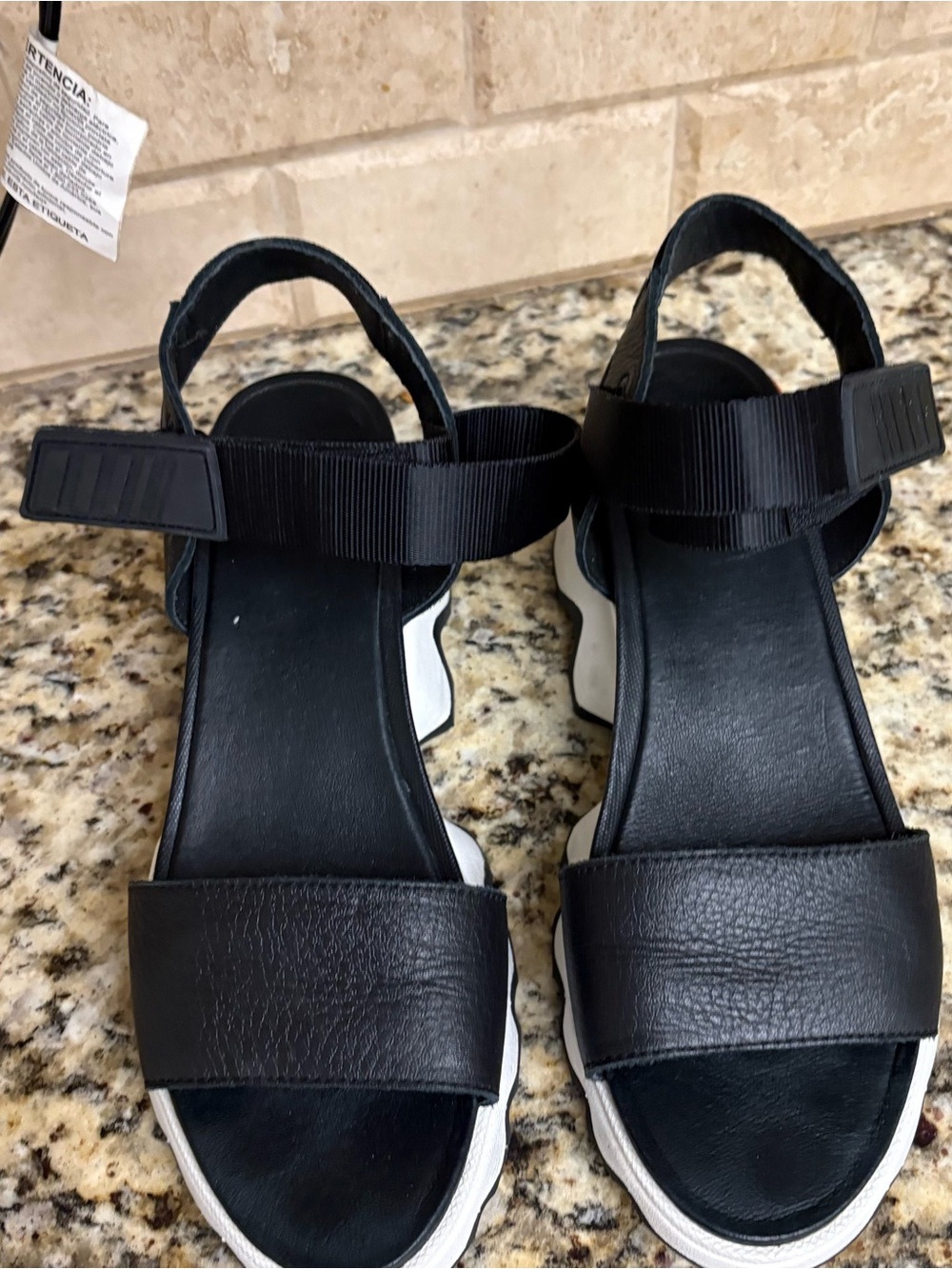 Sorel Black and White Sport Sandals with Adjustable Ankle Strap